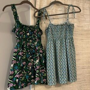 2 Motherhood Maternity Tops: Blue-Floral Print and blue-black graphic Print